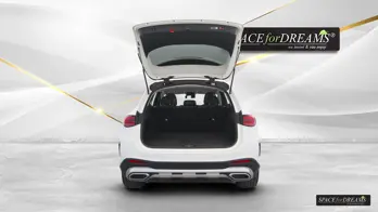 Folded down rear seats in a Mercedes GLC creating a flat surface with a perfectly unfolded Magic Rosé car mattress.