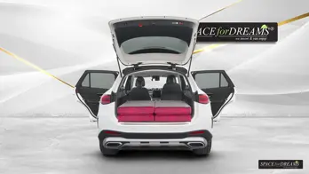  Luxurious Mercedes GLC cabin prepared for wonderful nights in nature with a spread out Magic Rosé folding mattress.
