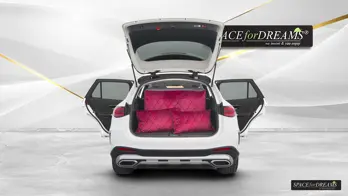 Neatly stored SPACEBED mattress in an elegant bag, taking up minimal trunk space for easy storage during road trips.