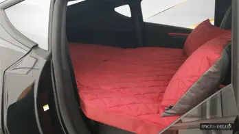 The side look into the vehicle reveals the outstanding material thickness of the Magic Rose mattress, turning any otherwise uncomfortable air mattress camping trip into pure glamping.